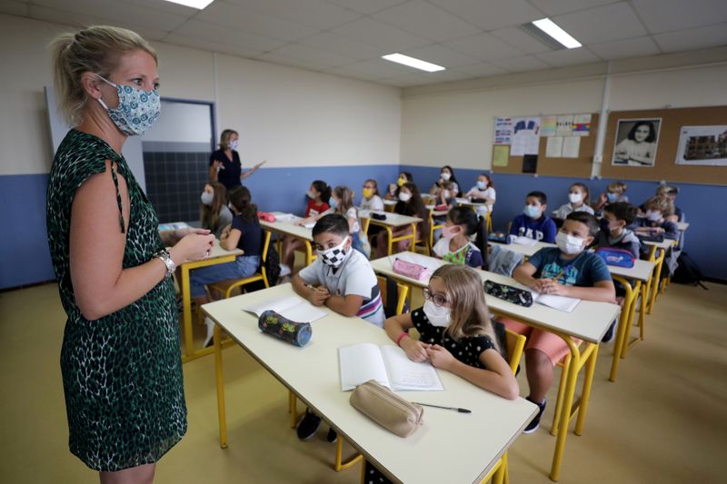 FILE PHOTO: French children resume school after summer break in