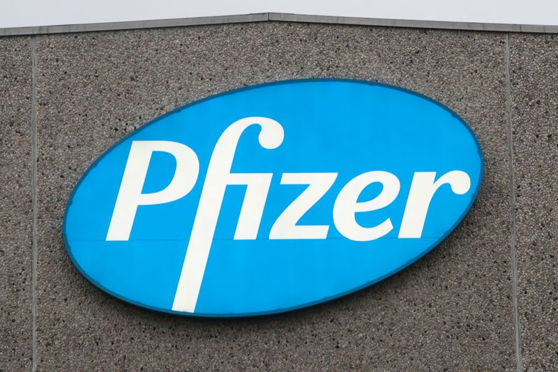 A logo of Pfizer is seen at the entrance to