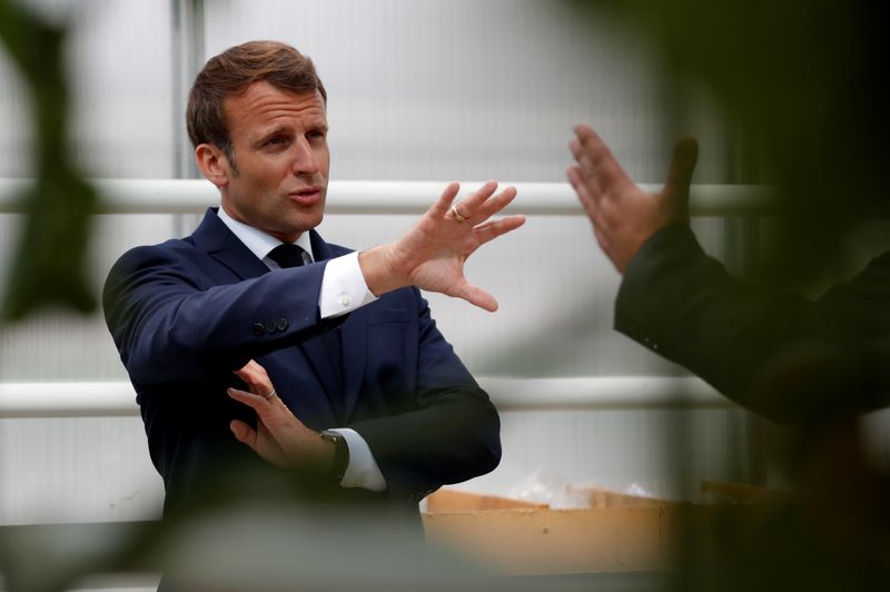 French President Emmanuel Macron meets farmers in Brittany