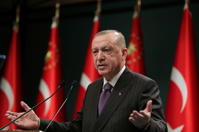 Turkish President Erdogan speaks during a news conference in Ankara