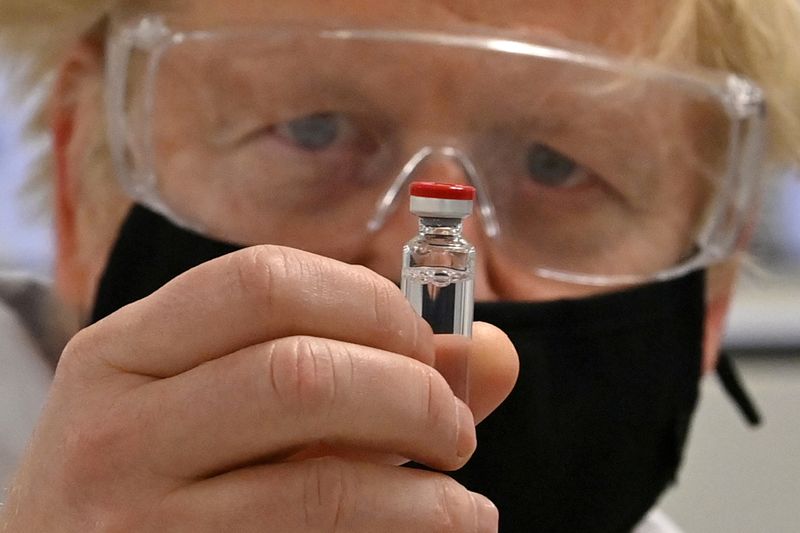 FILE PHOTO: Britain’s PM Johnson sees coronavirus vaccine manufacturing process