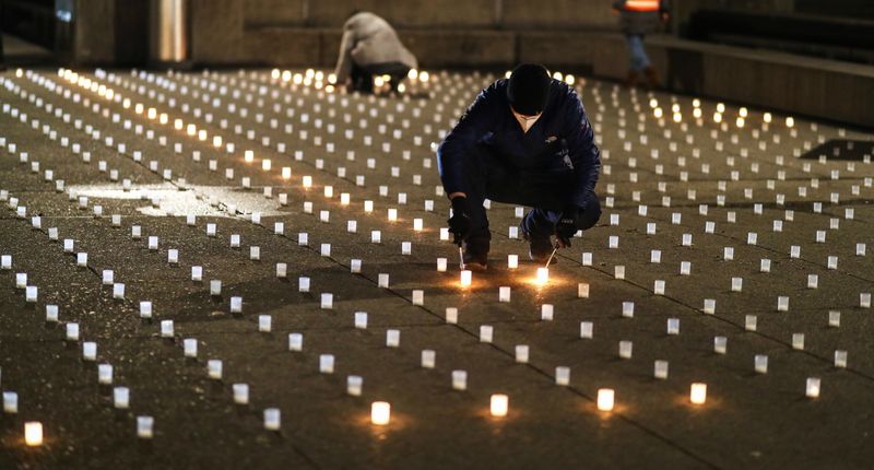 Candlelight vigil in memory of people who died of COVID-19,