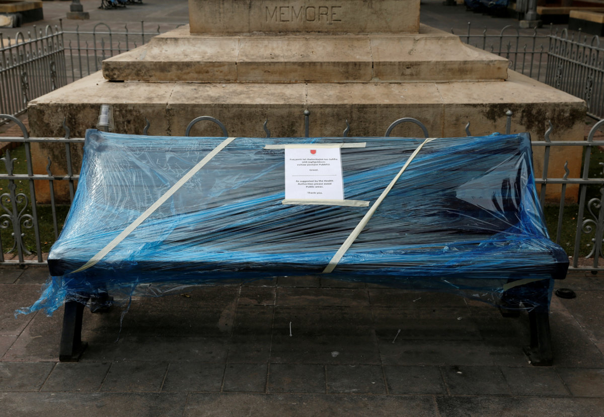 FILE PHOTO: A bench wrapped in shrink wrap to discourage