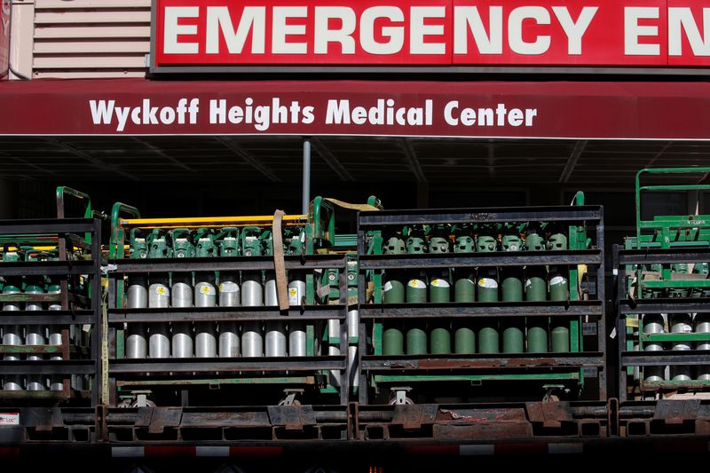 FILE PHOTO: Crates of Oxygen containers are seen stored outside