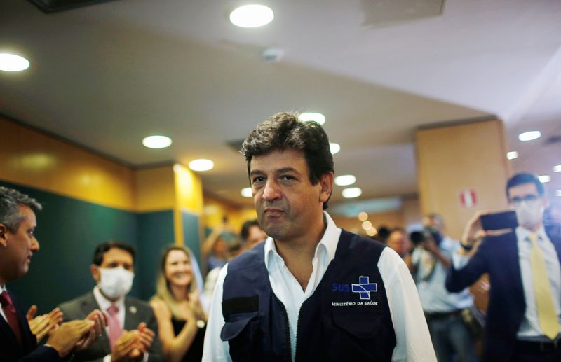 Brazil’s Minister of Health Luiz Henrique Mandetta arrives to a