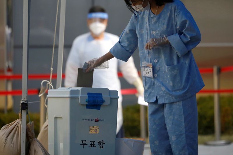 FILE PHOTO: South Korean coronavirus patients cast their ballots parliamentary