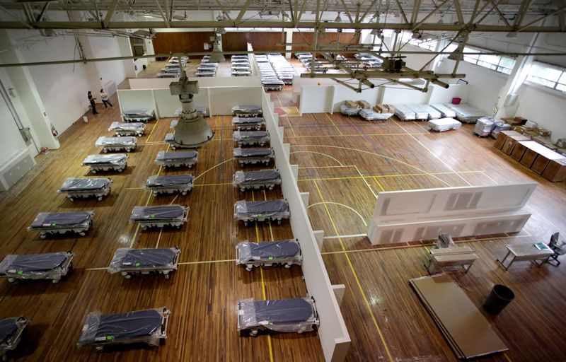 A view of beds inside a gym of the steelmaker