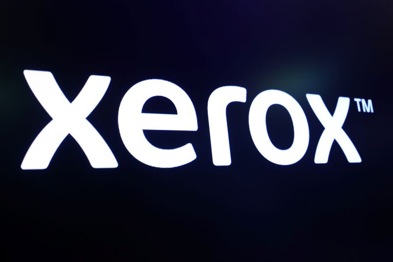 The company logo for Xerox is displayed on a screen