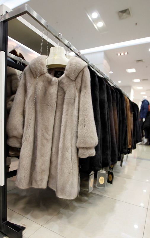 FILE PHOTO: Mink coats are displayed in a shopping mall