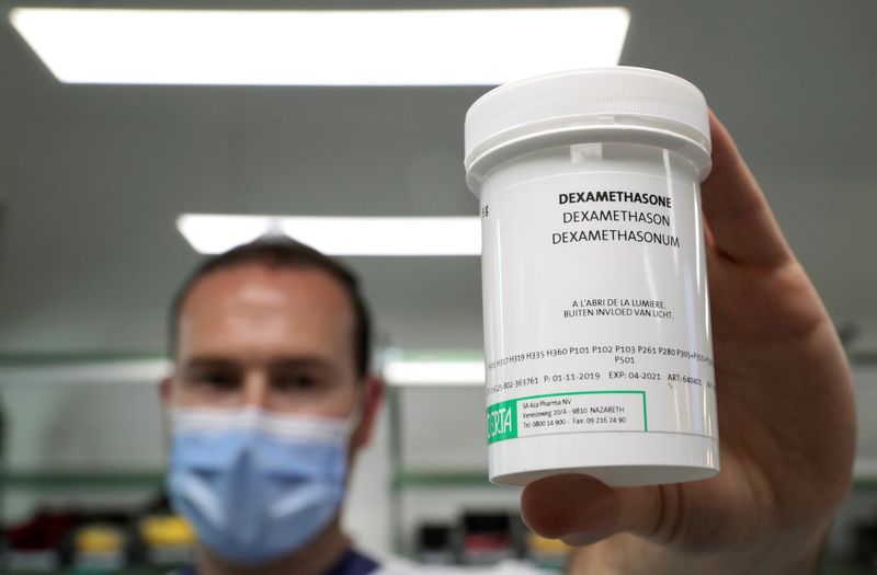 FILE PHOTO: A pharmacist displays a box of Dexamethasone at