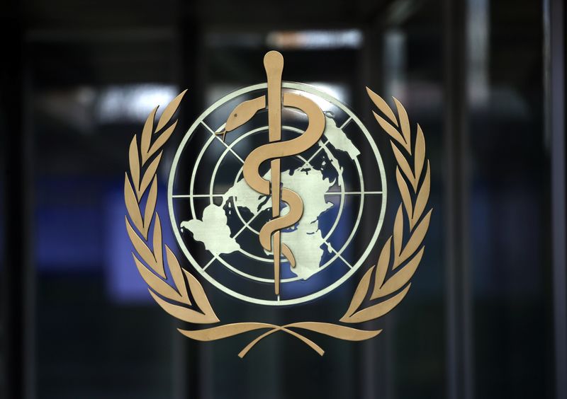 A logo is pictured on the headquarters of the WHO