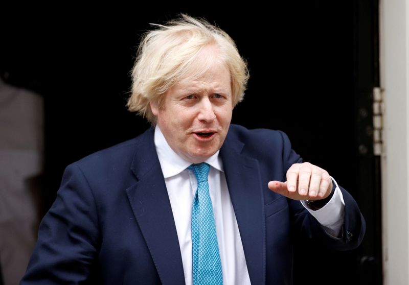 FILE PHOTO: Boris Johnson leaves Downing Street