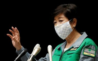 Tokyo Governor Yuriko Koike attends a joint news conference with