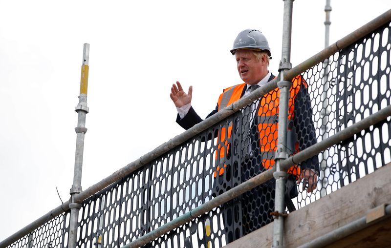 Britan’s PM Boris Johnson visists a construction site in Cheshire