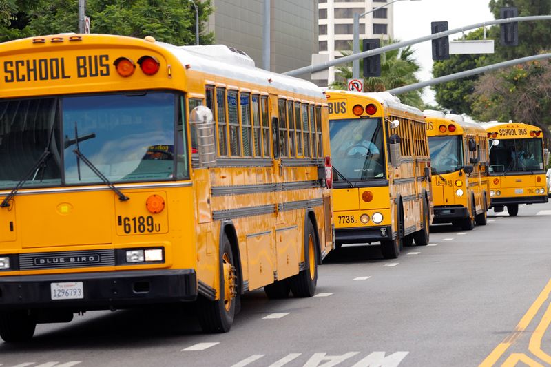 FILE PHOTO: School bus drivers take part in caravan to