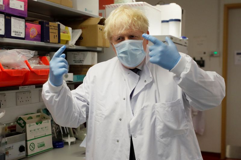FILE PHOTO:Britain’s Prime Minister Boris Johnson visits the Jenner Institute