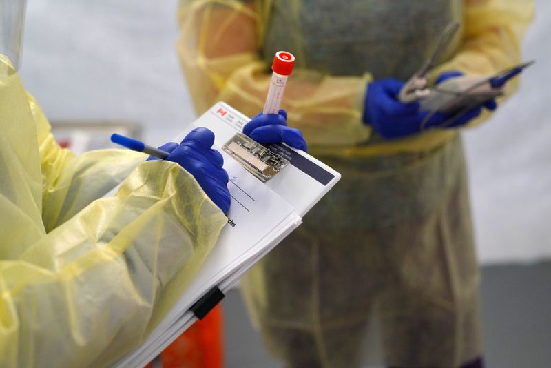 Provincial health workers perform coronavirus disease tests in Gull Bay