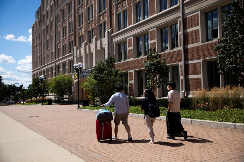 Students move back into the dorm for fall semester at
