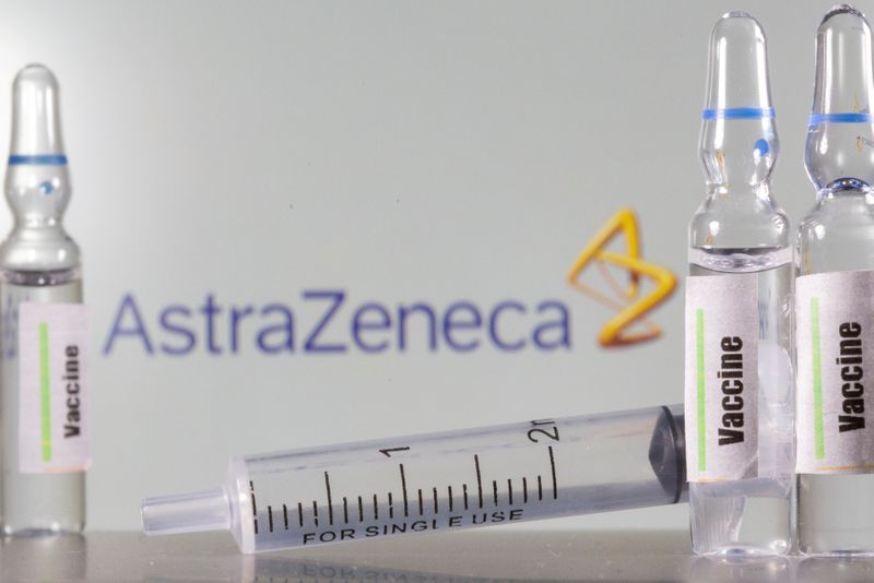 FILE PHOTO: A test tube labelled with the Vaccine is