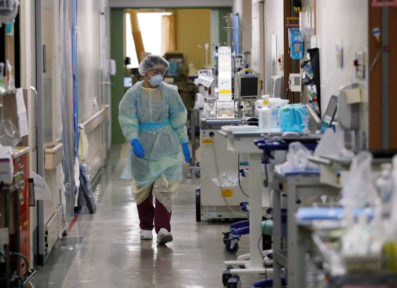 A medical personnel works in the ICU for the coronavirus