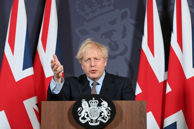 FILE PHOTO: British PM Johnson holds news conference on Brexit