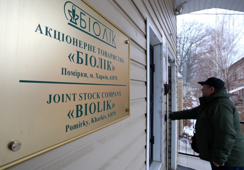 A man enters the headquarters of Ukrainian pharmaceutical company Biolik