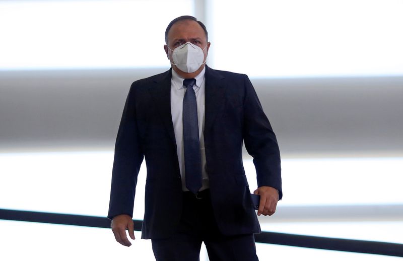 Brazil’s interim Health Minister Eduardo Pazuello walks before a ceremony