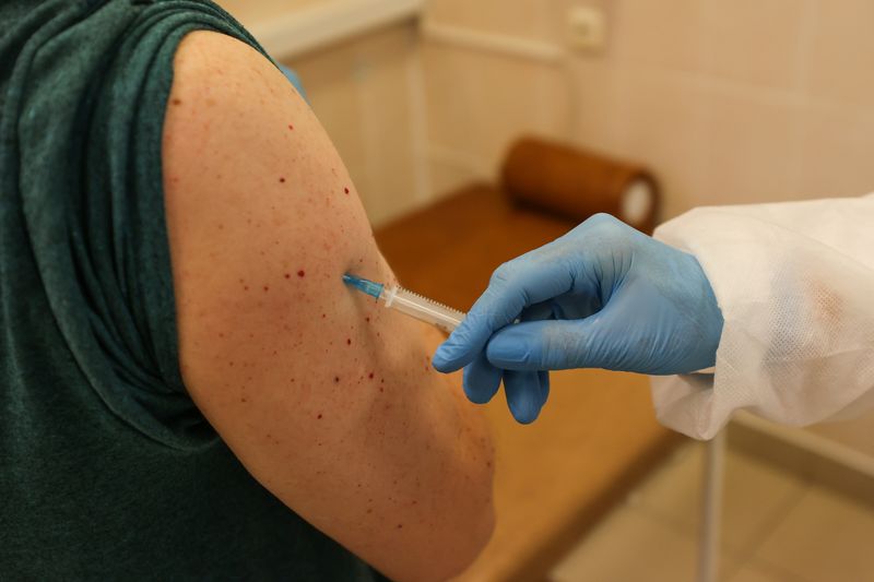 A person receives an injection with Sputnik V (Gam-COVID-Vac) vaccine