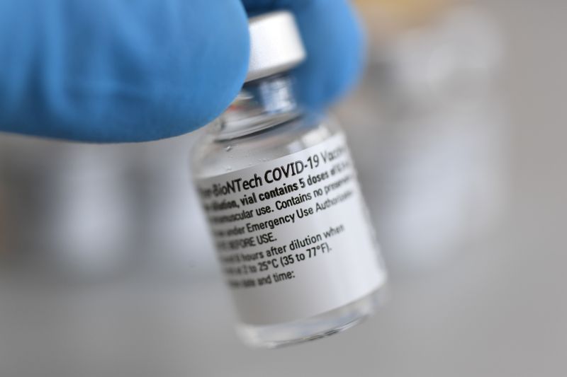 A vial containing doses of the Pfizer-BioNTech COVID-19 vaccine is