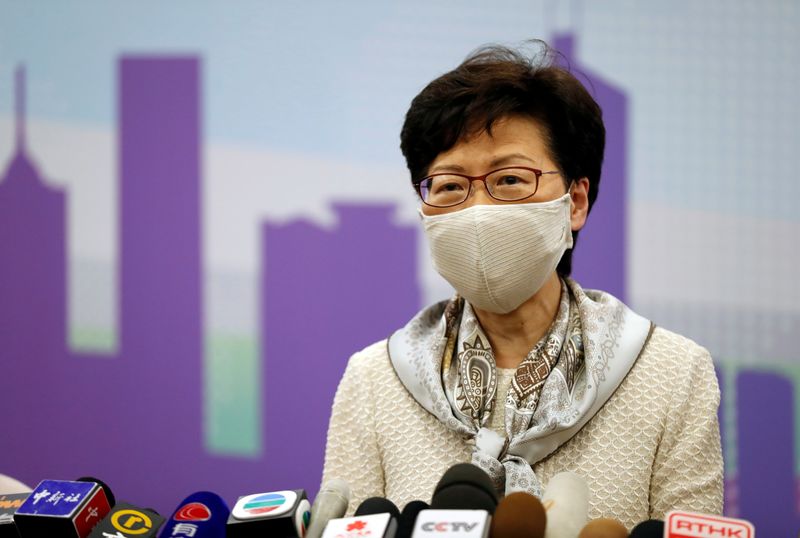 FILE PHOTO: Hong Kong Chief Executive Carrie Lam holds a