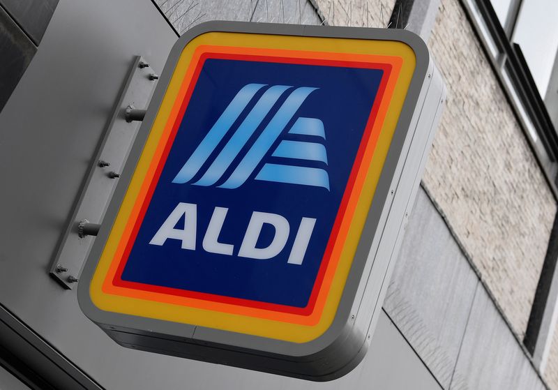 Signage is seen at a branch of Aldi Local, London