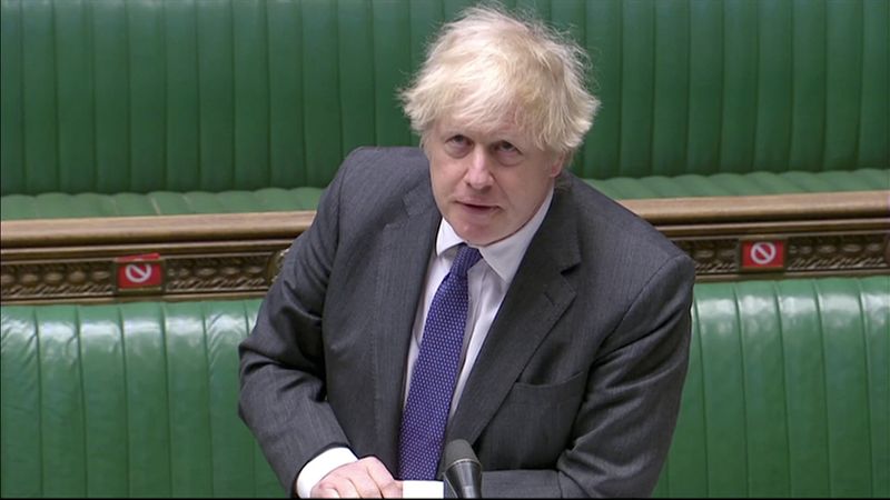 British Prime Minister Boris Johnson takes questions in parliament in