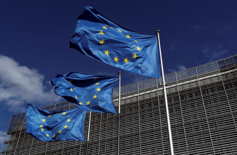 FILE PHOTO:  European Union flags flutter outside the European