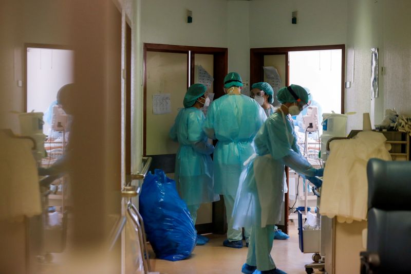 FILE PHOTO: Healthcare workers wear personal protective equipment in Santa