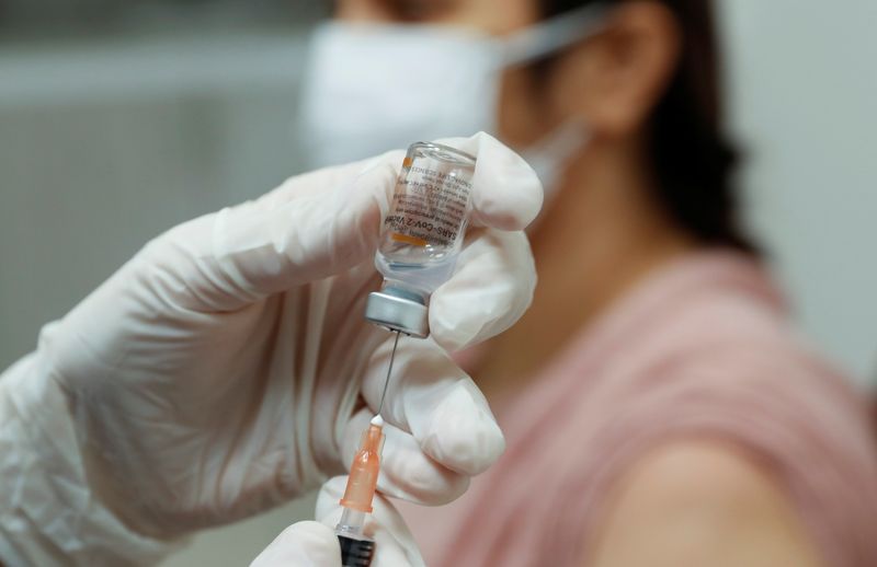 Turkey begins mass COVID-19 vaccinations with health workers, in Istanbul