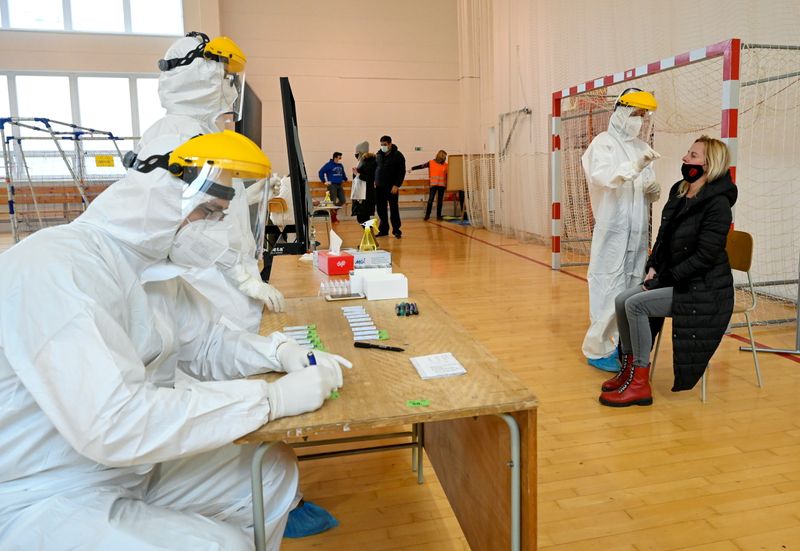 FILE PHOTO: Polish medics help in COVID-19 testing centres in