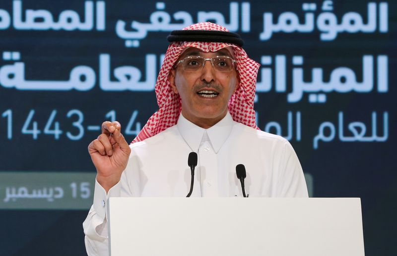 FILE PHOTO: Saudi Minister of Finance Mohammed al-Jadaan holds a