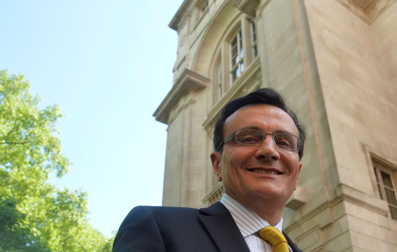 Chief Executive of AstraZeneca Pascal Soriot smiles as he leaves