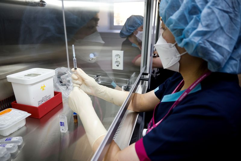 FILE PHOTO: A nurse takes part in the coronavirus disease