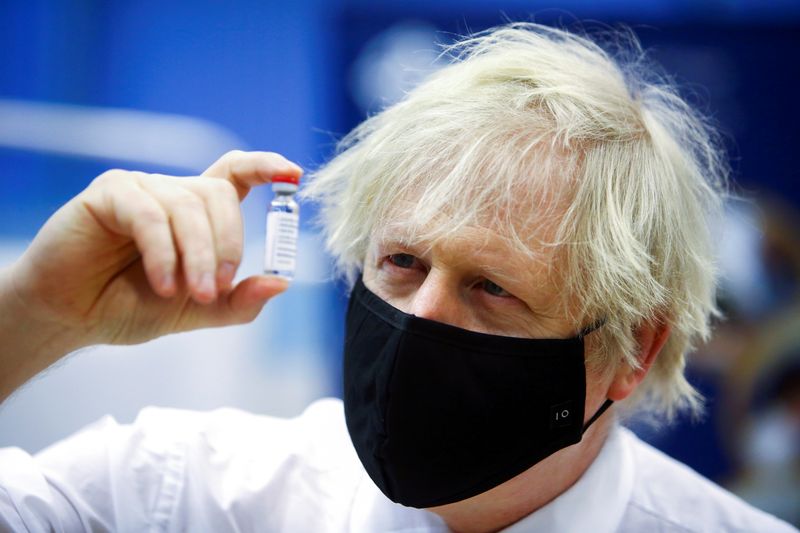 Britain’s Prime Minister Boris Johnson visits a vaccination centre at