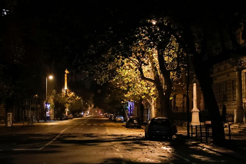 An empty street is seen during a night-time curfew imposed