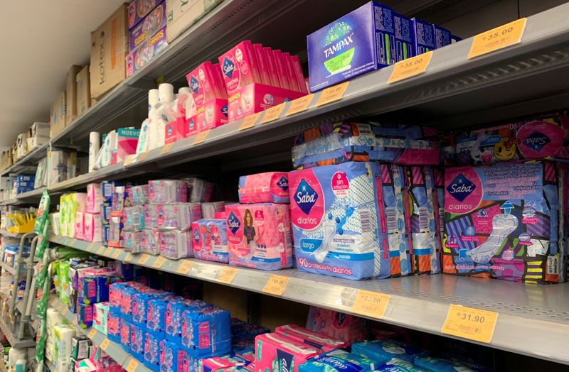 Women’s sanitary products are seen on the shelves inside a