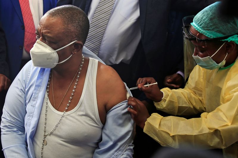 Zimbabwean Vice-President and Health Minister Constantino Chiwenga receives a coronavirus