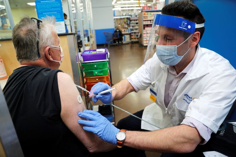FILE PHOTO:  Walmart administers COVID-19 vaccines as part of
