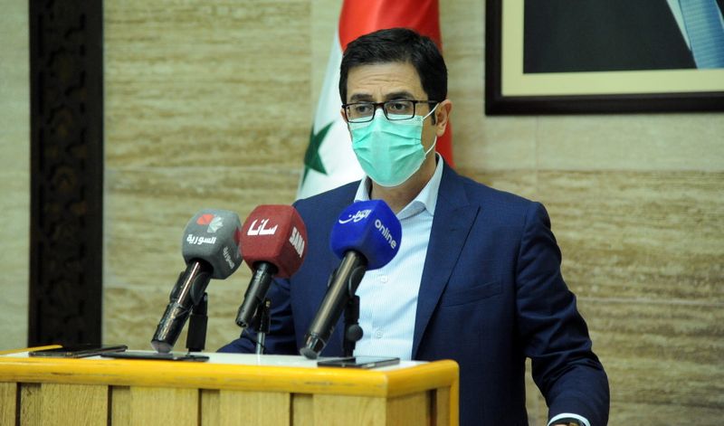 Syria’s health minister Hassan Ghabash speaks during a news conference