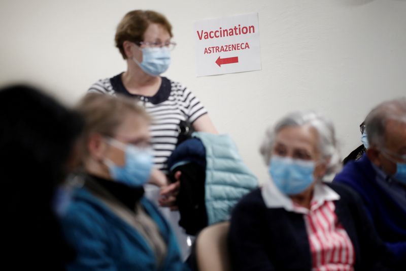 FILE PHOTO: Coronavirus disease (COVID-19) vaccination campaign in Stains
