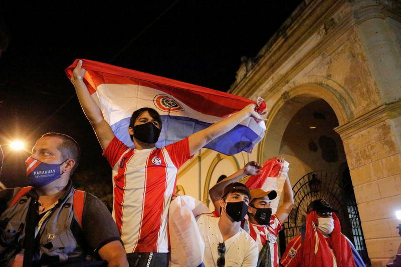 Paraguayans protest against President Mario Abdo Benitez’s health policies in