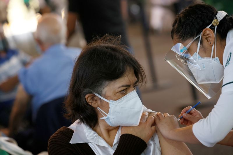 FILE PHOTO: Coronavirus disease (COVID-19) vaccination in Mexico City