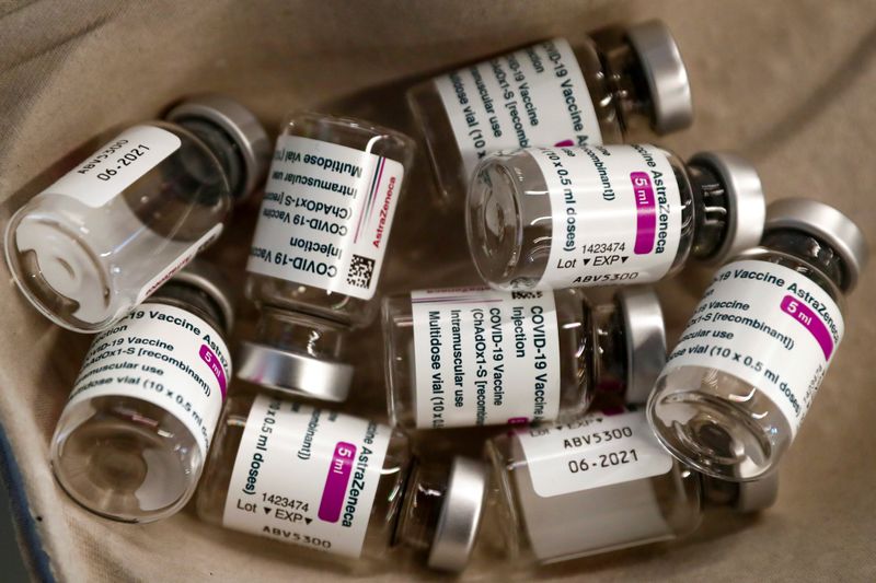 FILE PHOTO: Empty vials of AstraZeneca COVID-19 vaccine are seen
