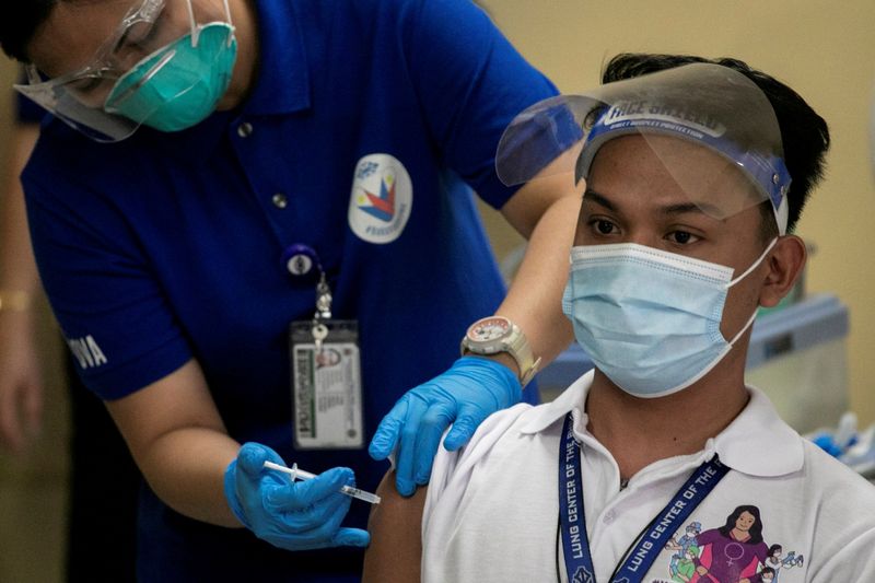 FILE PHOTO: FILE PHOTO: Philippines kicks off COVID-19 vaccination campaign